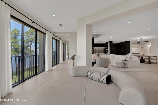 living room featuring a water view