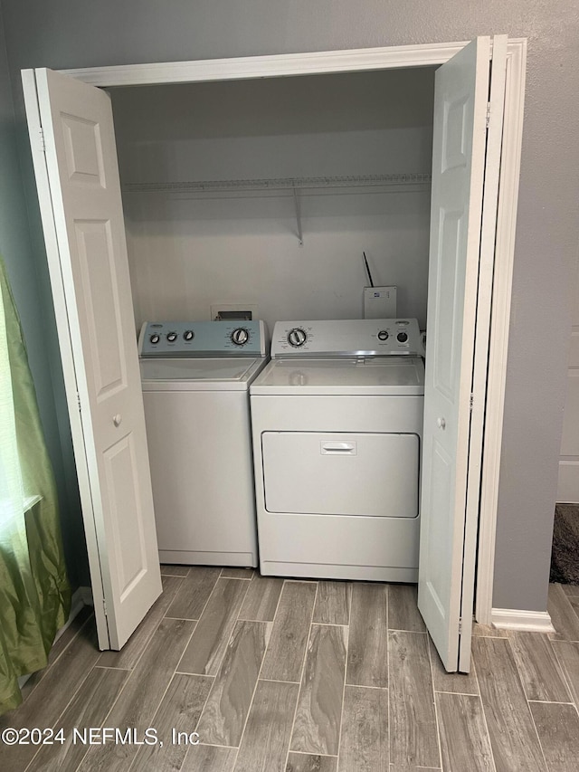 laundry area featuring washing machine and dryer