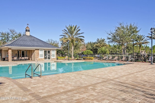 view of pool with a patio area