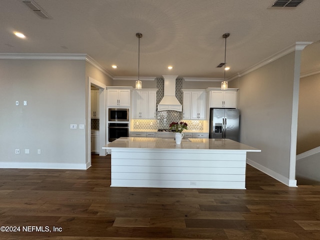 kitchen with premium range hood, white cabinetry, backsplash, a large island, and stainless steel appliances