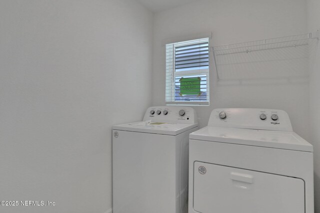 laundry room featuring independent washer and dryer