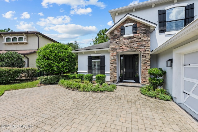 view of front of house with a garage