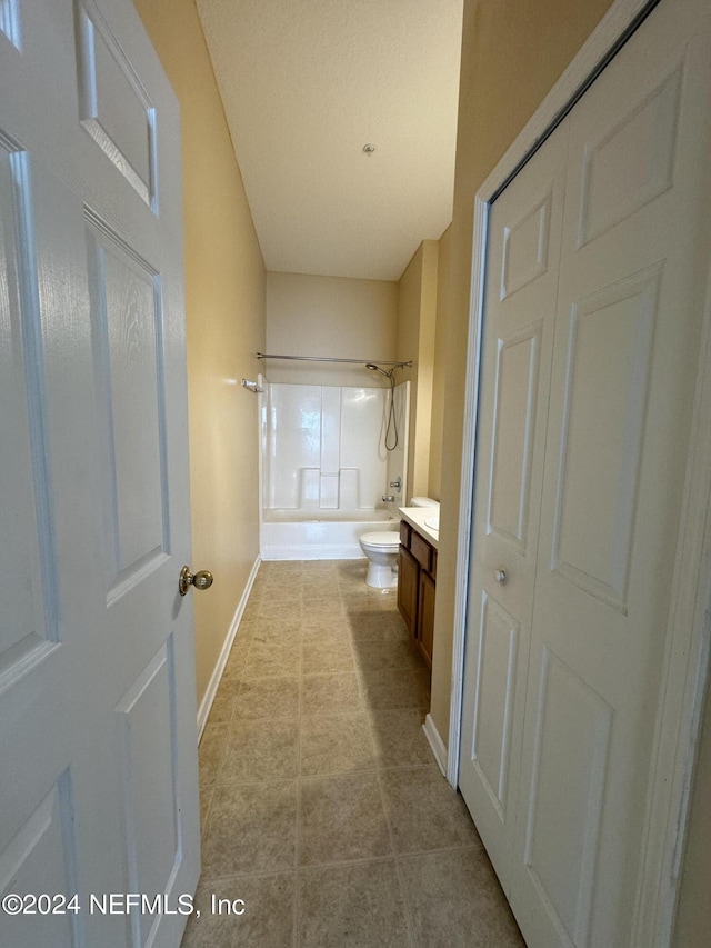 full bathroom featuring shower / washtub combination, toilet, and vanity