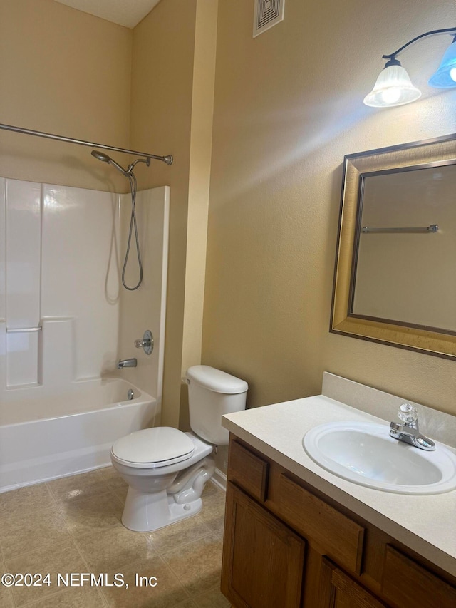 full bathroom with shower / bath combination, vanity, and toilet