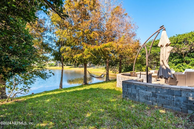 view of yard with a water view