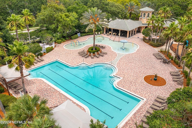 view of pool featuring a patio