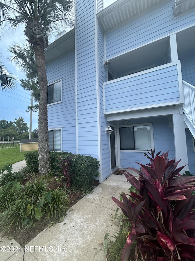 exterior space with a balcony