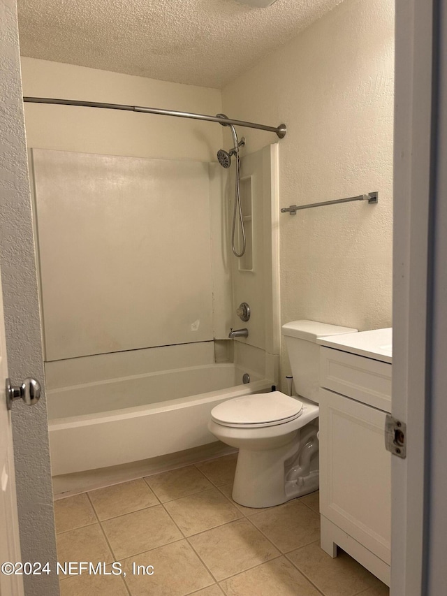 100 Fairway Park Blvd Unit 605, Ponte Vedra Beach, FL 32082 - full bath featuring vanity,  shower combination, a textured ceiling, tile patterned flooring, and toilet
