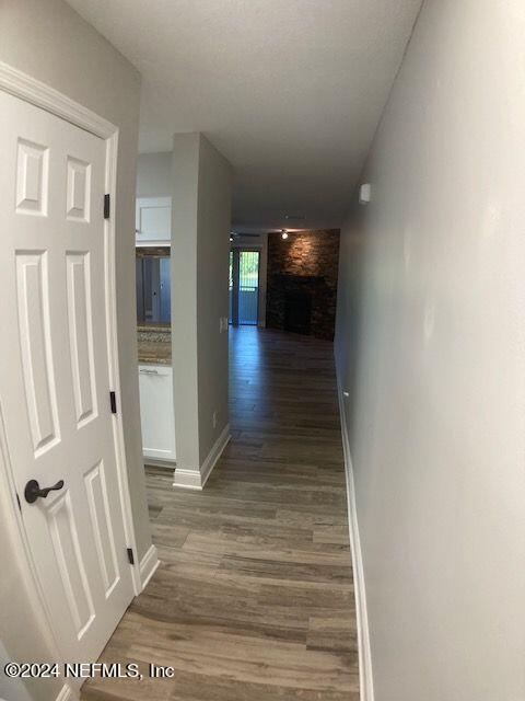 hall featuring dark hardwood / wood-style floors