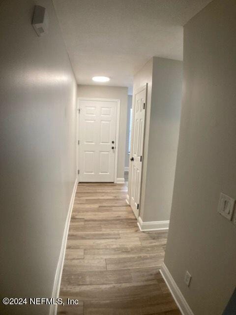 hall featuring light hardwood / wood-style flooring