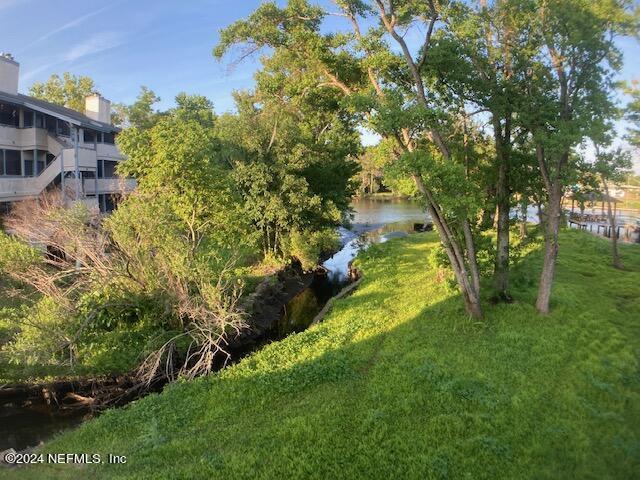 view of yard with a water view