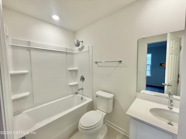 full bathroom with vanity, toilet, and washtub / shower combination