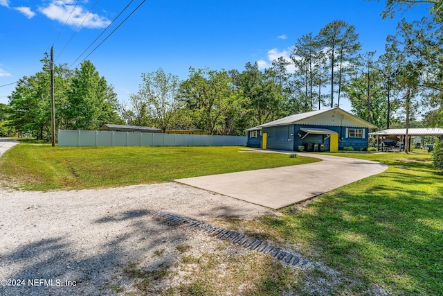 view of yard featuring a garage