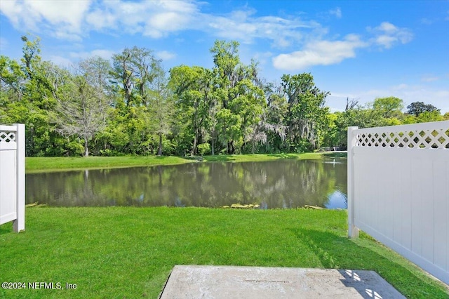 view of yard with a water view