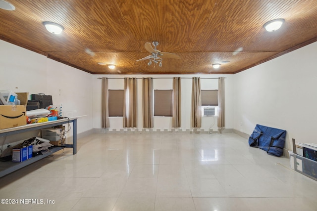 basement featuring cooling unit, light tile patterned floors, wooden ceiling, and ceiling fan