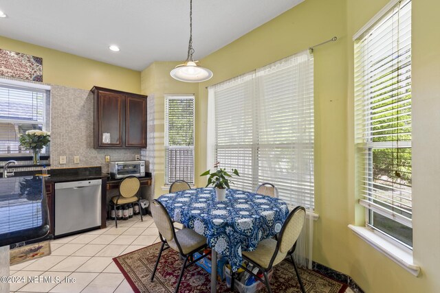 dining room with light tile patterned floors