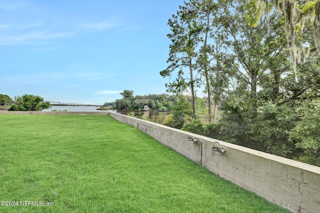 view of yard featuring a water view