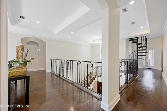 24554 Harbour View Dr, Ponte Vedra Beach, FL 32082 - hallway featuring a raised ceiling, ornamental molding, wood finished floors, recessed lighting, and arched walkways