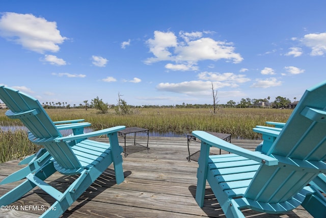 24554 Harbour View Dr, Ponte Vedra Beach, FL 32082 - wooden deck featuring a view of rural / pastoral area and a dock