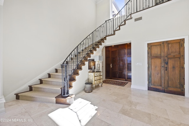 24554 Harbour View Dr, Ponte Vedra Beach, FL 32082 - entrance foyer featuring a towering ceiling and stairway