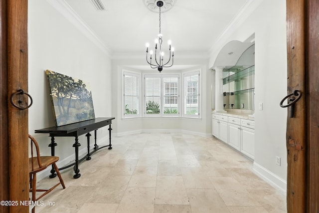24554 Harbour View Dr, Ponte Vedra Beach, FL 32082 - corridor with crown molding and a chandelier