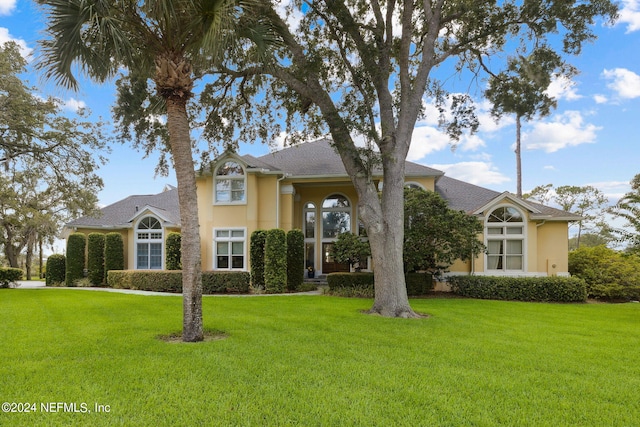 view of front of house with a front yard