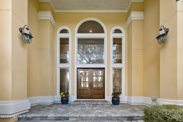 entrance to property featuring french doors