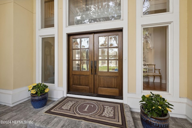 entrance to property featuring french doors