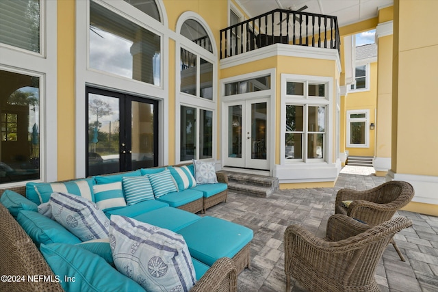 view of patio with outdoor lounge area and french doors