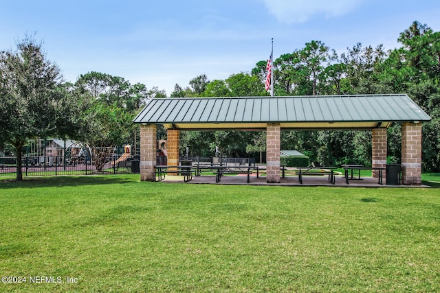 view of community featuring a gazebo and a lawn