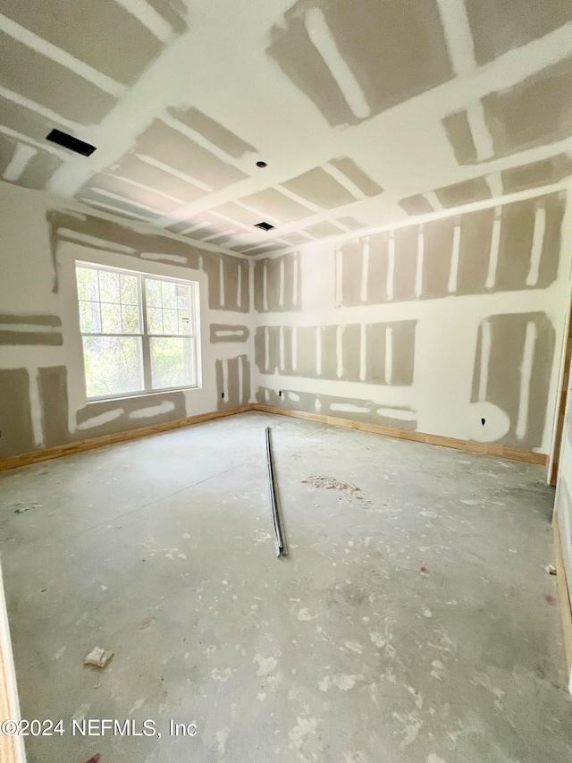 interior space with concrete flooring