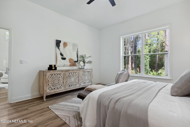 bedroom featuring ceiling fan and hardwood / wood-style floors