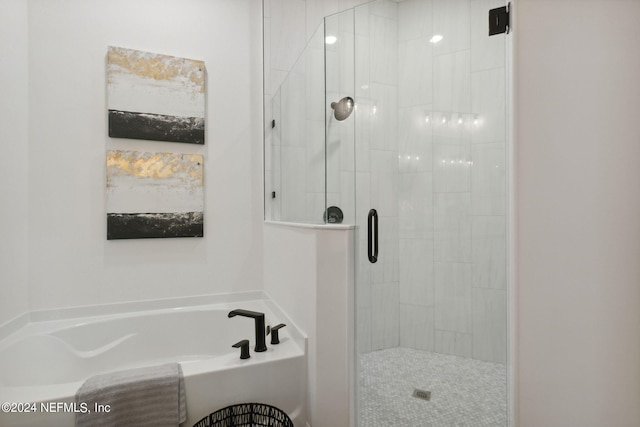 bathroom with independent shower and bath