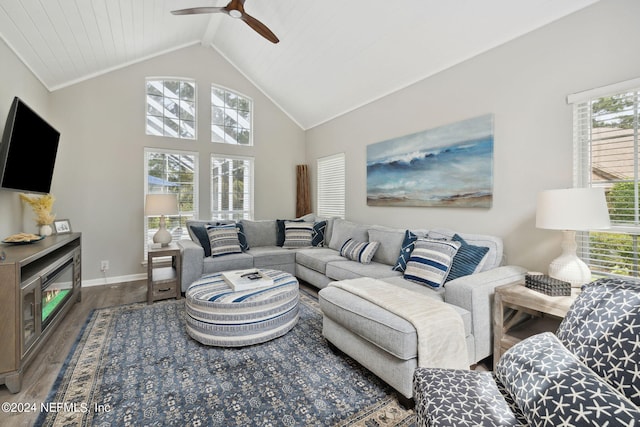 living room with vaulted ceiling with beams, hardwood / wood-style flooring, ceiling fan, and wooden ceiling