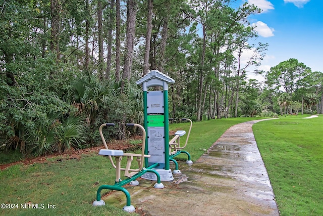 view of jungle gym with a lawn