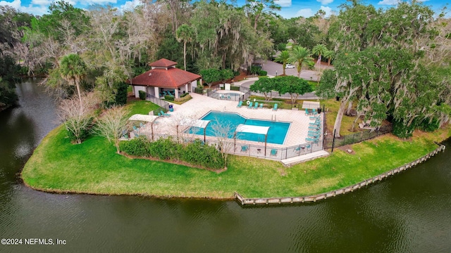 drone / aerial view featuring a water view