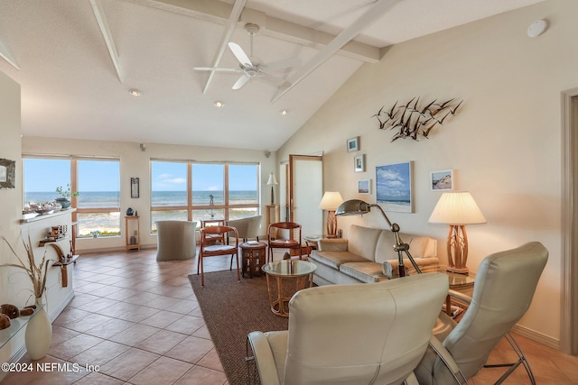 living room featuring a water view, high vaulted ceiling, light tile patterned floors, beamed ceiling, and ceiling fan