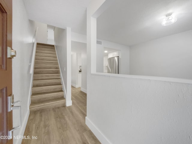 interior space with light hardwood / wood-style flooring