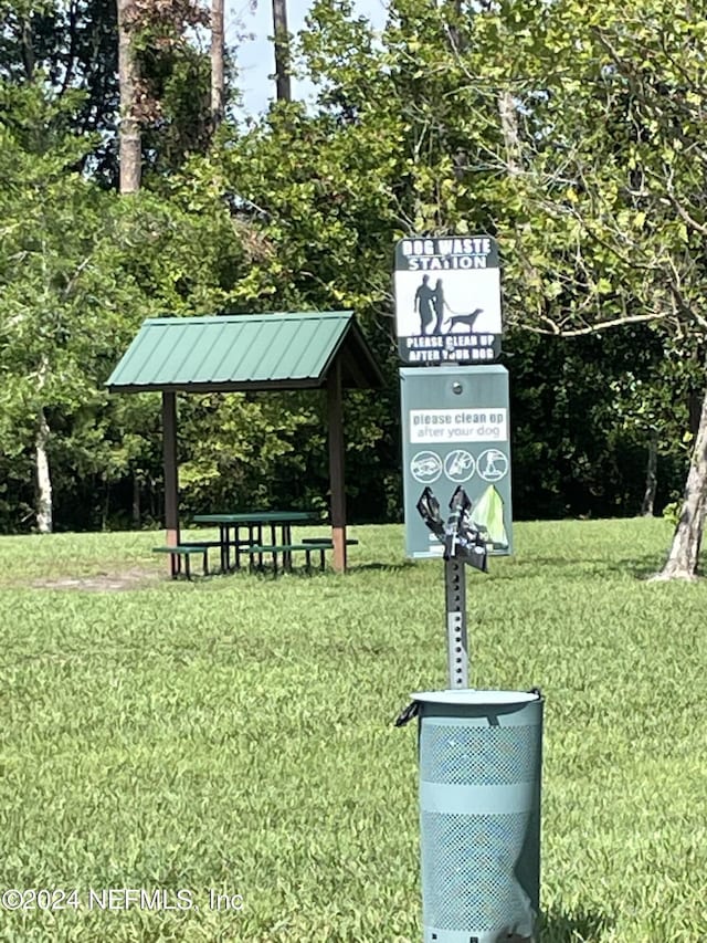 surrounding community with a lawn