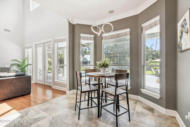 dining room featuring ornamental molding