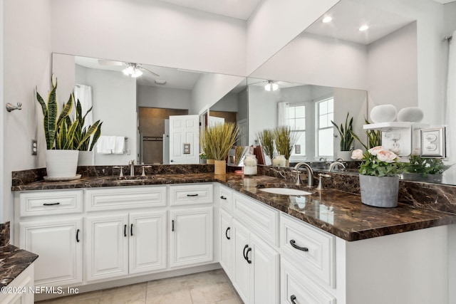 bathroom with vanity, tile patterned floors, and ceiling fan