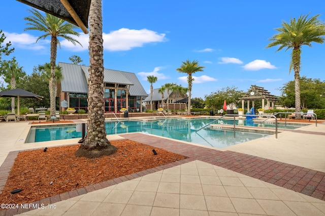 view of pool with a patio area