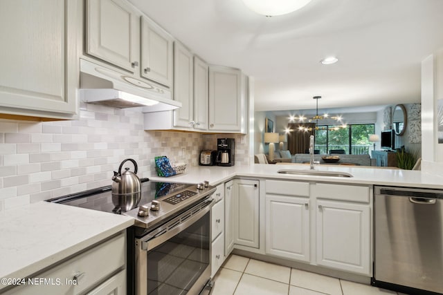 kitchen with sink, white cabinetry, and appliances with stainless steel finishes