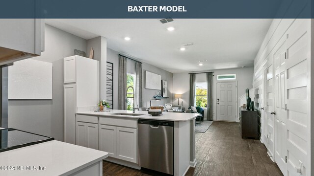 kitchen featuring dishwasher, sink, white cabinets, and dark hardwood / wood-style flooring