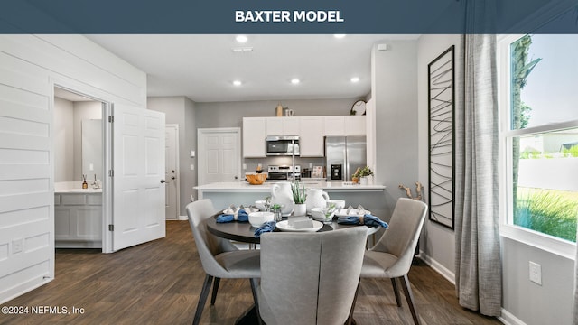 dining area with recessed lighting, baseboards, and dark wood-style floors