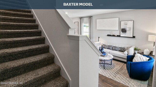 staircase featuring wood-type flooring