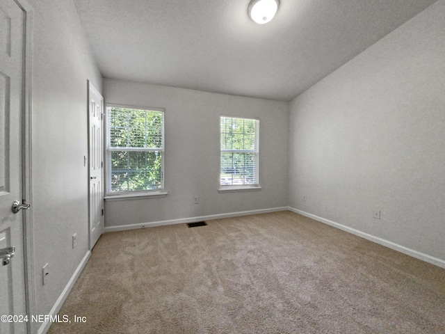 view of carpeted spare room