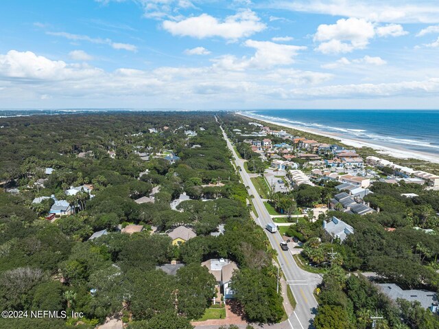 bird's eye view with a beach view and a water view