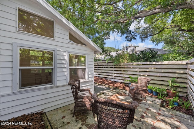 305 Garden Ln, Atlantic Beach, FL 32233 - view of patio / terrace featuring fence