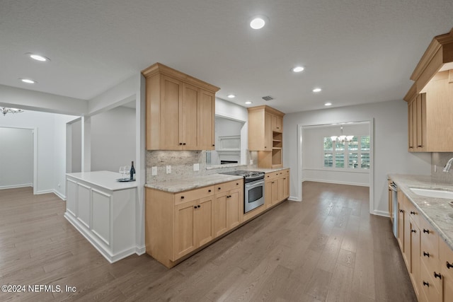 305 Garden Ln, Atlantic Beach, FL 32233 - kitchen featuring a chandelier, appliances with stainless steel finishes, open shelves, and light brown cabinetry